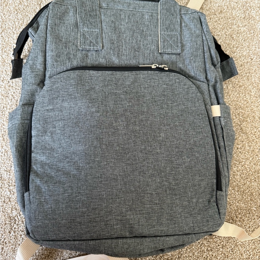 Baby bag with changing station
